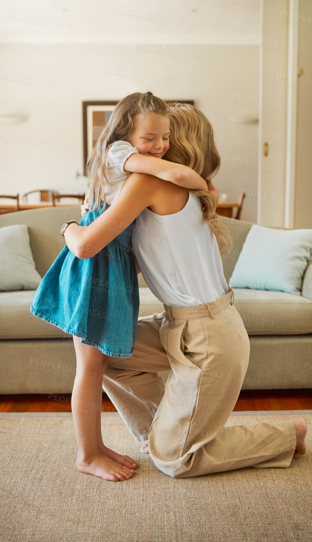 Buy stock photo Mother, kid and hug in home with love, healthy relationship and trust in family. Single mom, happy daughter and embrace in living room for support, affection or proud moment for child development