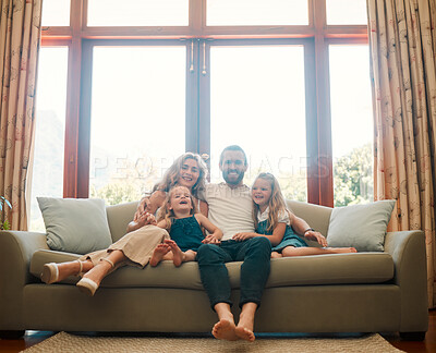 Buy stock photo Parents, children and smile on sofa with support, bonding and relax on weekend. Happy couple, young kids and family portrait in home living room with trust, care and healthy relationship in Australia