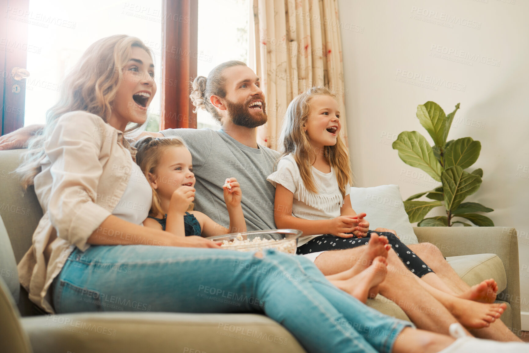 Buy stock photo Happy, sofa and family in home watching tv, movie or show together for entertainment online. Relax, love and girl children streaming film with parents in living room for bonding on weekend in house