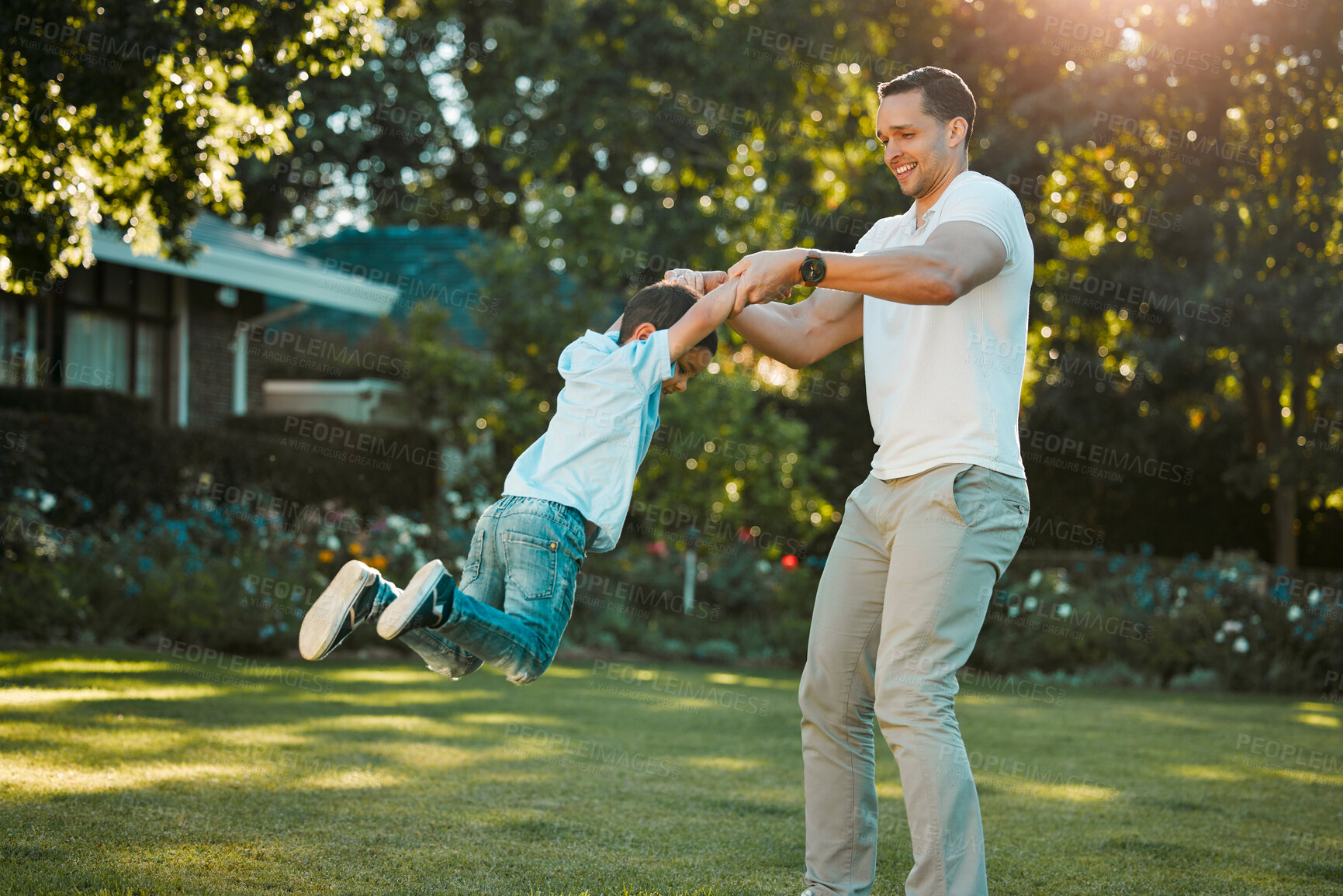 Buy stock photo Spinning, father and child with playing in garden for fantasy game, support and trust with weekend fun. Happy people, energy and imagination activity in backyard for development and bonding by home