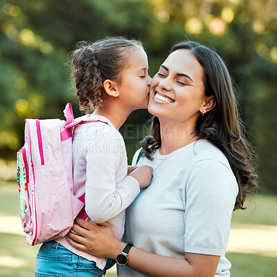 Buy stock photo Back to school, mother and kiss child at park for care or support for first day with family. Love, girl or mom with elementary student ready for education, start learning or goodbye with happy parent