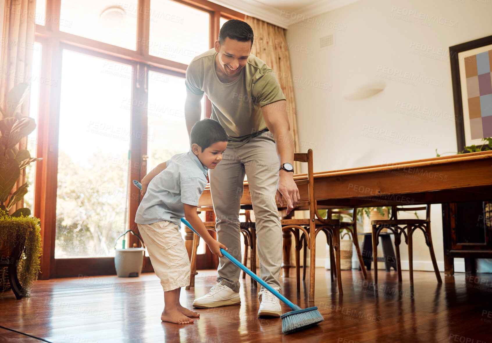 Buy stock photo Cleaning, father and kid help with sweeping in home for household chores, development and learning responsibility. People, housework tasks and floor maintenance for support, bonding and dirt removal