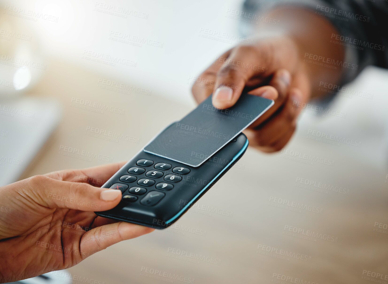 Buy stock photo Customer shopping with credit card money and paying using digital nfc technology while buying in a store. Closeup of two hands making a finance, online banking or consumerism transaction from above