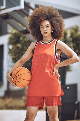 Buy stock photo Basketball court, woman player or sports person with afro looking serious at training, workout and exercise or competition ball game. Fitness portrait of healthy athlete with motivation or vision