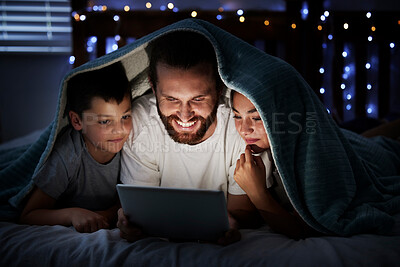 Buy stock photo Happy, parents and kids with tablet at night of storytelling, watching movies or bonding together. Smile, family and children on digital for streaming cartoon, online ebook and entertainment at house