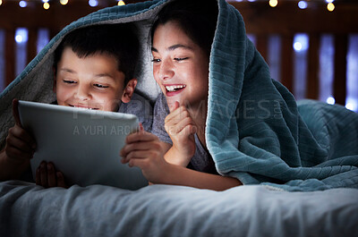 Buy stock photo Happy, children and relax with tablet at night for storytelling, watching movies and bonding together. Family, kids and digital with streaming cartoon, reading ebook and online entertainment at house