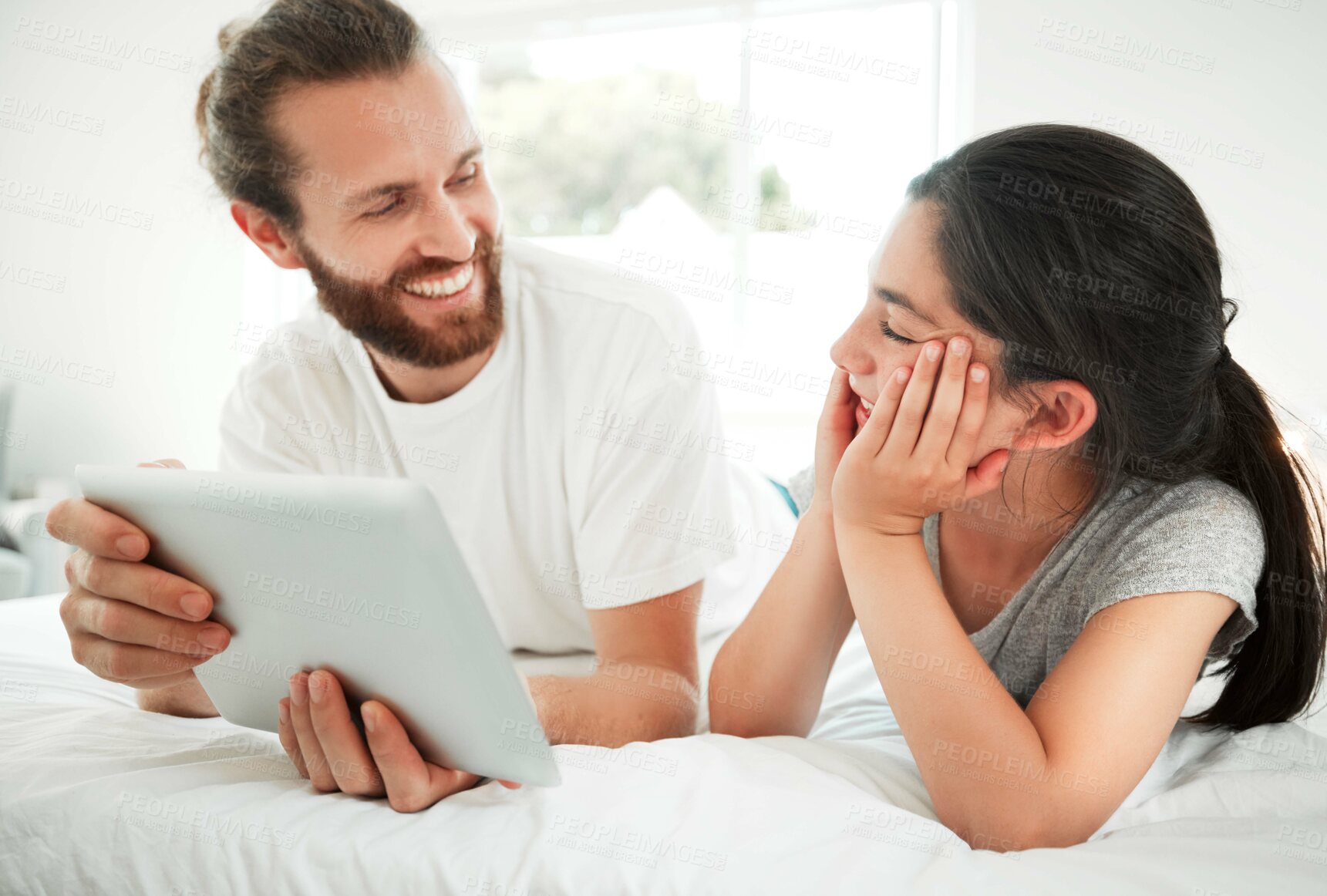 Buy stock photo Tablet, bedroom and happy father relax with kid, education or learning together in family home. Digital technology, girl and dad in bed, streaming movie or watch cartoon on internet app with parent