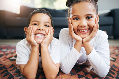 Buy stock photo Children, siblings and portrait on floor of home, relax and bonding together for relationship. Kids, brother and sister for happy family love in living room, security and support or trust on mat