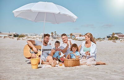 Buy stock photo Beach, picnic or happy family love guitar music while bonding or relaxing on summer holiday vacation. Grandfather, dad and mother enjoying quality time with children siblings eating watermelon fruit