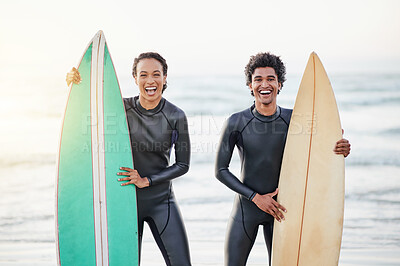 Buy stock photo Portrait, sports and surfing friends on the beach during summer for fun or recreation together. Surfboard, water or workout with a man and woman surfer standing in the ocean for training or leisure