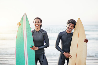 Buy stock photo Portrait, sport and surfing friends on the beach together during summer for fun or recreation. Surfboard, water or workout with a man and woman surfer standing in the ocean for training or leisure