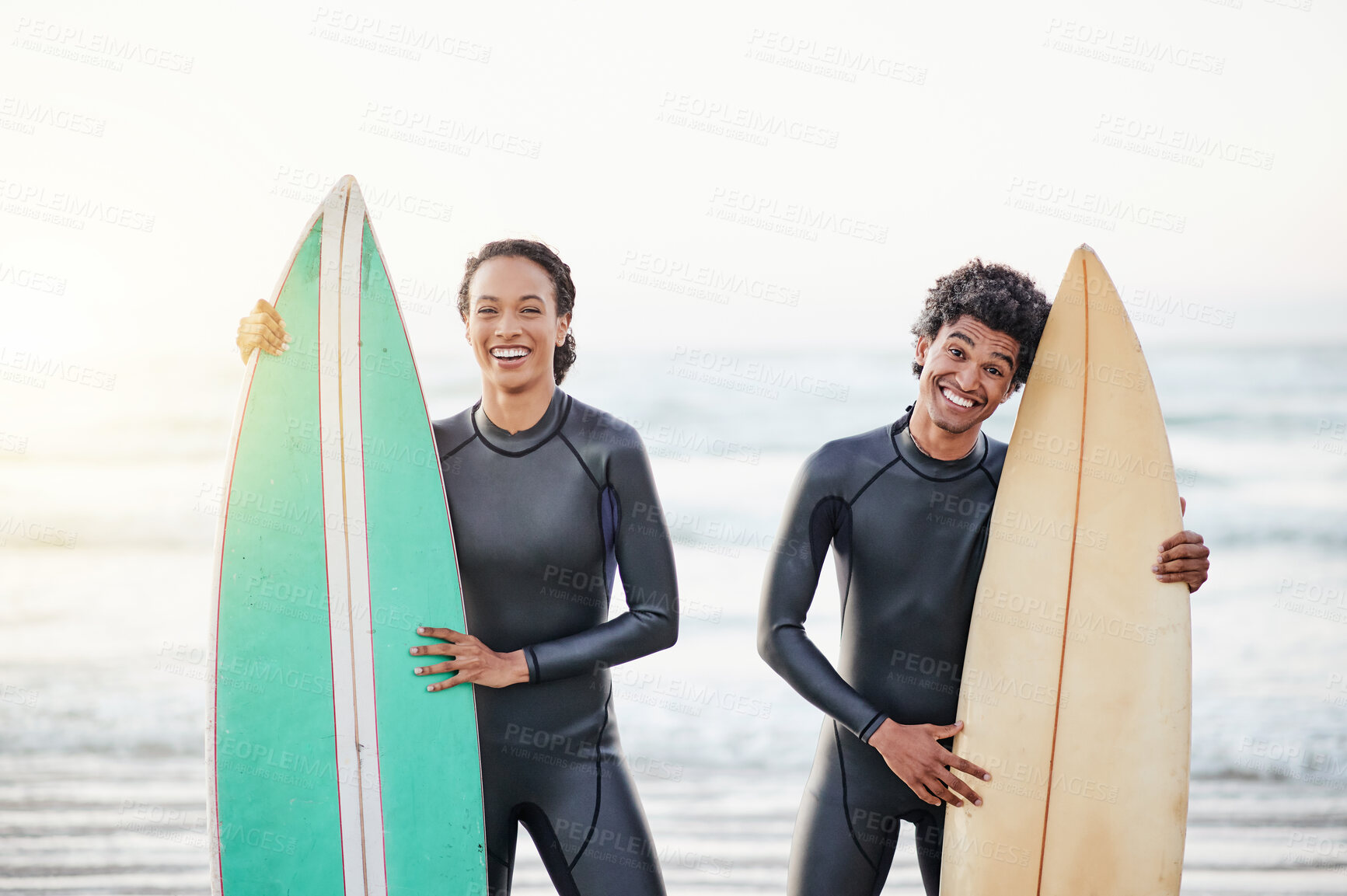 Buy stock photo Portrait, sport and surfing friends on the beach together during summer for fun or recreation. Surfboard, water or workout with a man and woman surfer standing in the ocean for training or leisure