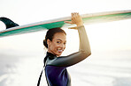 Portrait, surfer or happy woman at sea for fitness training, workout or sports exercise at sunrise. Surfing, surfboard or mixed race athlete smiling on fun summer holiday vacation on Hawaii beach 