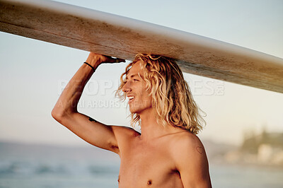 Buy stock photo Man at the beach at sunset, surfboard and summer with freedom and ocean view. Young male outdoor, sport and fitness with surfer, tropical destination and happy in nature with adventure and surfing