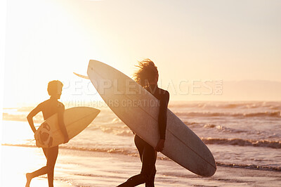 Buy stock photo Sunset, surfboard and men running, beach and fitness for wellness, training and workout on seaside vacation. Male athletes, surfers and friends on holiday, mockup and break for fun, relax and getaway