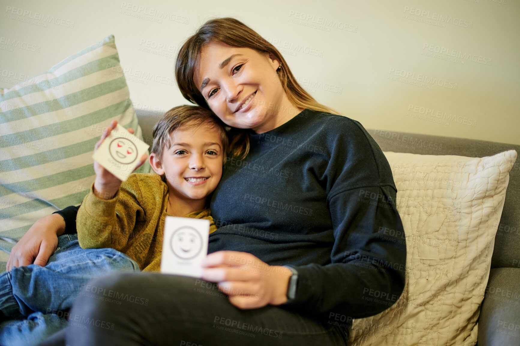 Buy stock photo Happy, card and portrait of a woman and child learning about emotions in therapy. Smile, showing and a mother and a student with paper to show feelings and teaching emotional intelligence at home