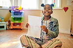 Portrait, kids or art with a black girl in class, holding paper and looking creative or learning at school. Children, education and a cute female child sitting in a classroom for artistic development