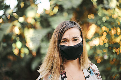 Buy stock photo Happy woman, portrait and face mask outdoor with bokeh light in nature with safety and covid gear. Happiness, positive and young female in fresh air during pandemic with corona and protection masks