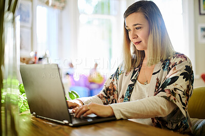 Buy stock photo Laptop, typing and woman in home office for email, project or online browsing in house. Freelancer, remote worker and person or professional with computer for research, writing and web scrolling.