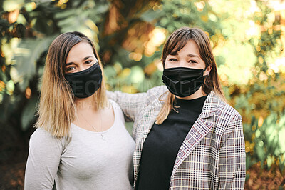 Buy stock photo Portrait, Covid and women in face mask or friends outdoors in nature together feeling happy or confident. Morning, love and family or female siblings or sisters bonding in a garden to relax