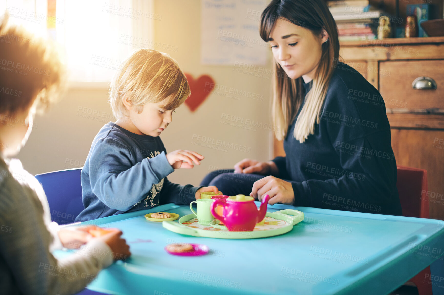 Buy stock photo Mother, kids and play tea party in home, having fun and bonding together. Relax, children and drinking from toy cup with mama playing game with boys for imagination, childhood or pretending in house.