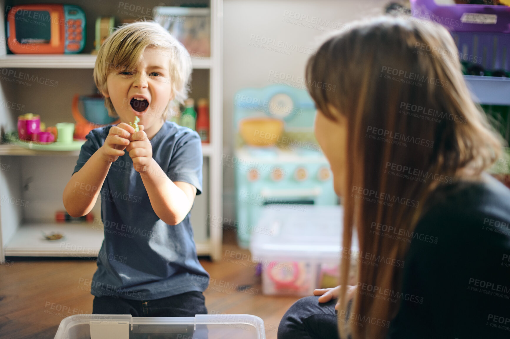 Buy stock photo Fun, playful and the portrait of a child with a teacher for play therapy and mental development. Happy, education and a student with a woman for playing, childcare and counseling in a classroom