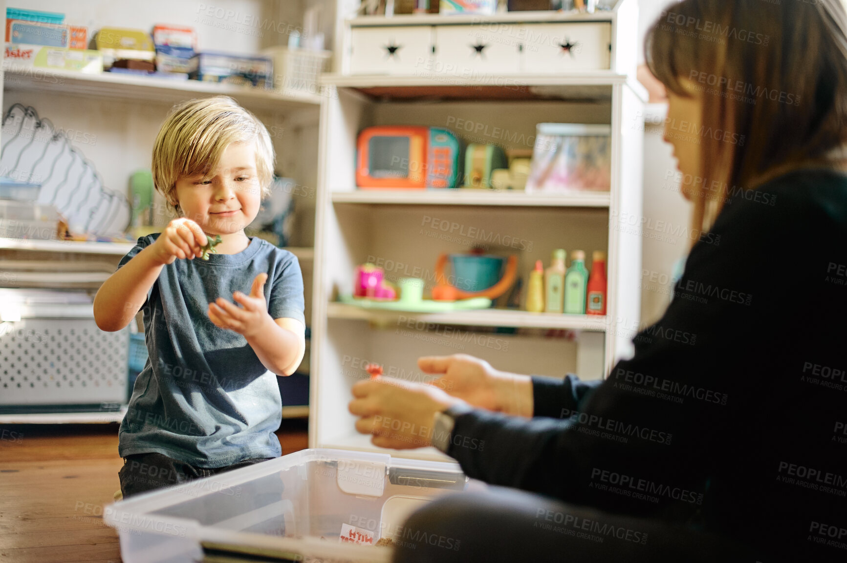 Buy stock photo Mother, child and playing with toys in home, bonding and having fun together. Care, development and mama with boy or kid play with toy, learning and education while enjoying quality time in house.