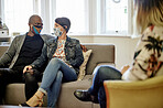 Therapy, marriage counselling and couple on couch, talking and share feelings with psychologist. Married, man and woman with therapist, speaking and help with relationship problem, issue and masks  