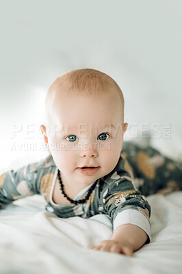 Buy stock photo Adorable, relax and portrait of a baby on a bed for sleep, resting and comfort. Looking, content and the face of a child lying in the bedroom for rest, nap or to wake up in the morning at home