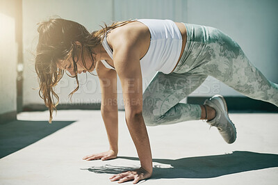 Buy stock photo Fitness, woman and mountain climber exercise in city, town and urban ground for training, workout and energy. Young female athlete on floor outdoor for bodyweight challenge, balance and strong sports
