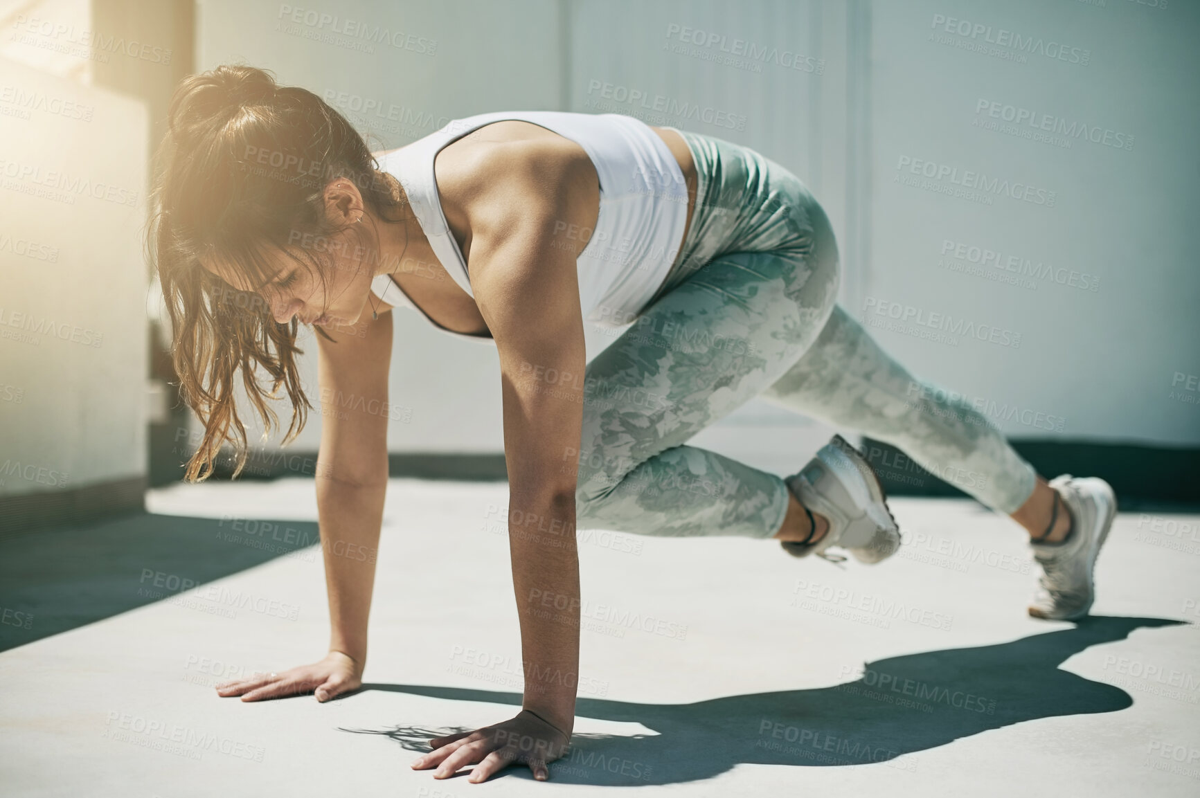 Buy stock photo Exercise, woman and mountain climber workout for fitness in city, town and urban ground of training, action or energy. Young female athlete on floor outdoor for bodyweight challenge, balance or power