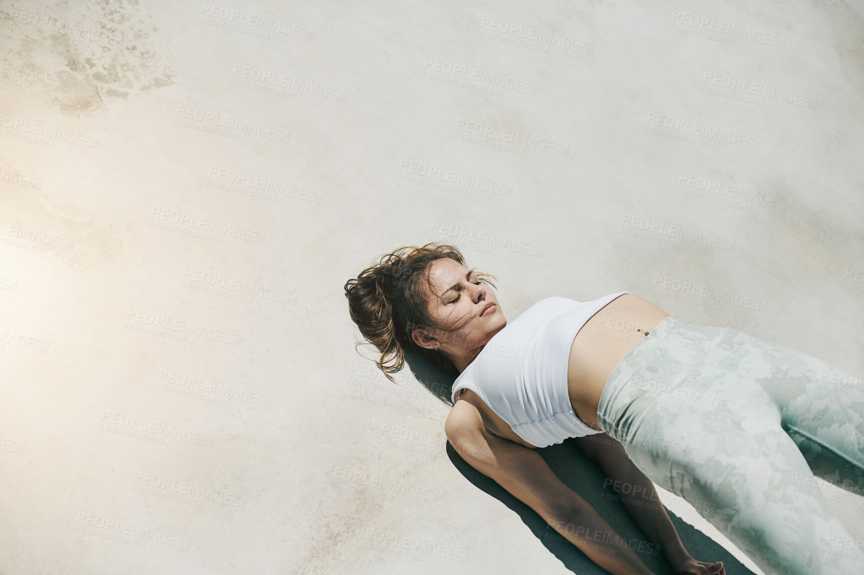 Buy stock photo Fitness, woman and stretching body on floor in preparation for workout, exercise or running outdoors. Sporty, fit or active female in warm up back stretch getting ready for exercising on urban mockup