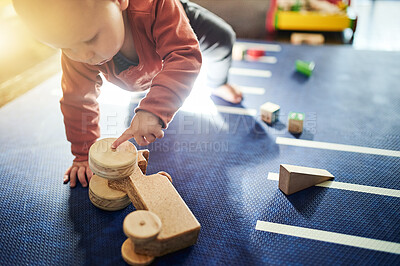 Buy stock photo Playtime, education and baby with toys for learning, mental development and childhood. Game, youth and toddler playing with a toy at kindergarten for activity, educational skill and play on the floor