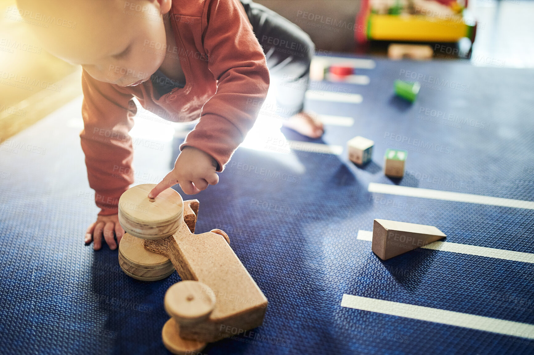 Buy stock photo Playtime, education and baby with toys for learning, mental development and childhood. Game, youth and toddler playing with a toy at kindergarten for activity, educational skill and play on the floor
