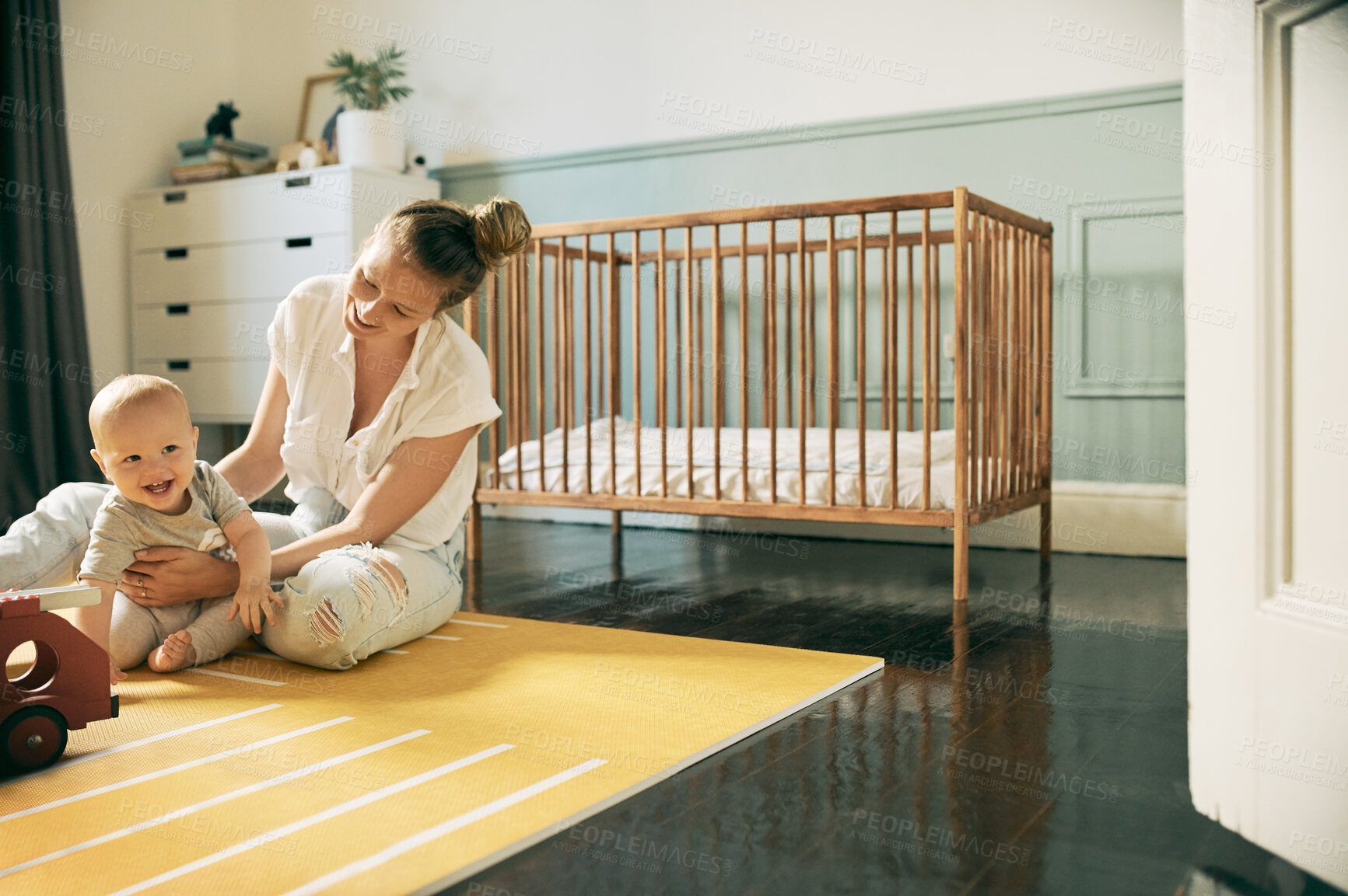 Buy stock photo Baby, bonding and mother playing with infant on the floor of a house or home for child development. Care, motherhood and single parent or woman having fun with newborn kid with happiness