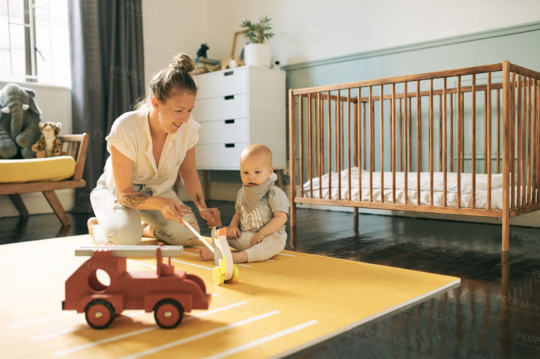 Buy stock photo Baby, toys and mother play in home, having fun and learning, relax or bonding. Development, care and happy mama with kid, newborn or toddler playing or enjoying quality time together in house nursery