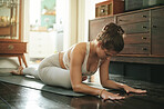 Yoga stretching, home and fitness woman with floor warm up, pilates or relax workout, wellness or self care. Exercise challenge girl, health lifestyle yogi and female person with peace in living room