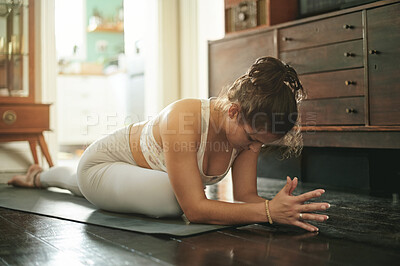 Buy stock photo Yoga stretching, relax and fitness woman with floor warm up, pilates or home workout, wellness or pigeon pose. Morning exercise girl, health lifestyle yogi and female person training in living room