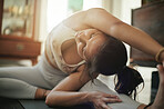 Yoga stretching, exercise and calm woman start body warm up, relax pilates or fitness workout, wellness routine or self care. Yogi peace, health lifestyle and female person training on lounge floor