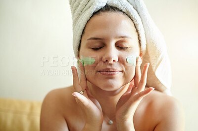 Buy stock photo Facial, lotion and woman using beauty product on her face for skincare and self care in her home or house. Detox, mask and female cleaning her skin for morning routine and she relax with closed eyes