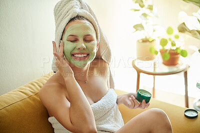 Buy stock photo Facial, treatment and happy woman using cosmetic product on her face for beauty, skincare and self care in her home or house. Detox, mask and female cleaning her skin for morning routine and relax