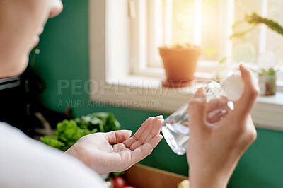 Buy stock photo Hands, sanitizer and woman in kitchen for food preparation, nutrition and home for cooking dinner. Female chef, hand hygiene and cleaning for bacteria to make meal, recipe and work for healthy lunch