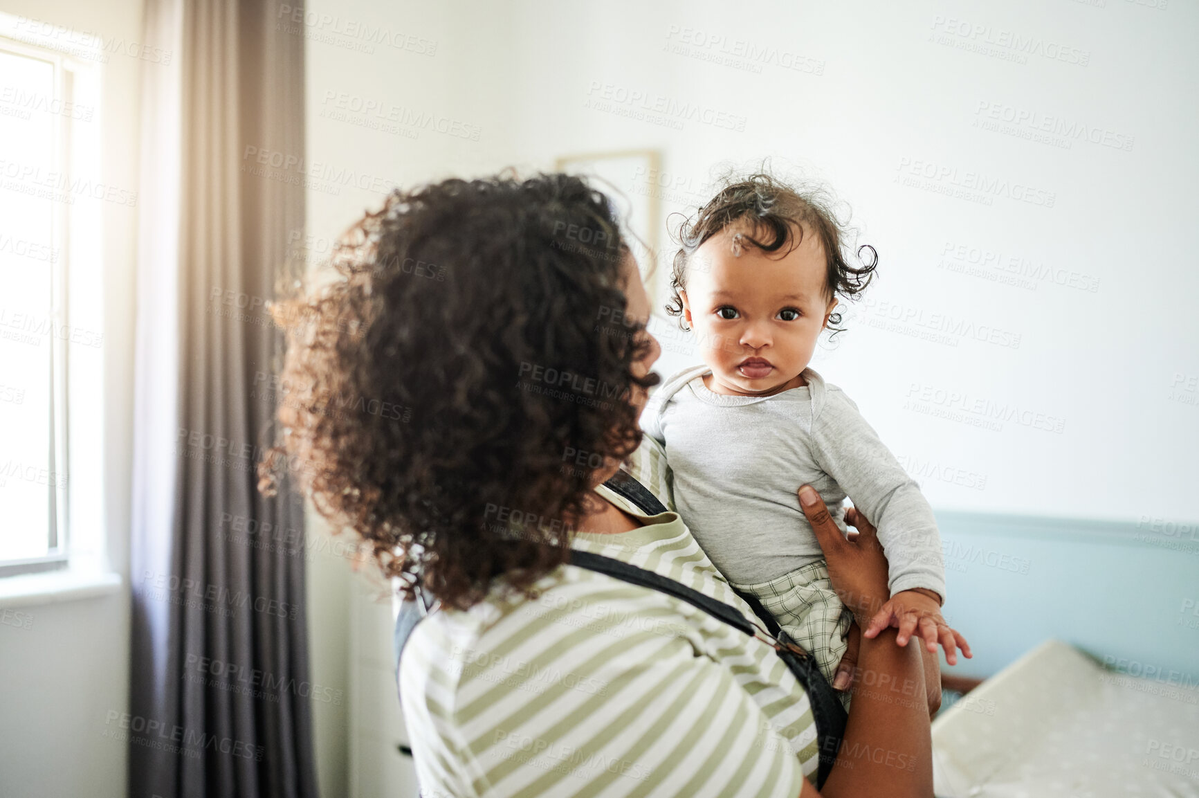 Buy stock photo Love, bonding and woman with baby in his nursery embracing, playing and connecting at their home. Happiness, smile and young mother holding her infant newborn boy in bedroom of their modern house.