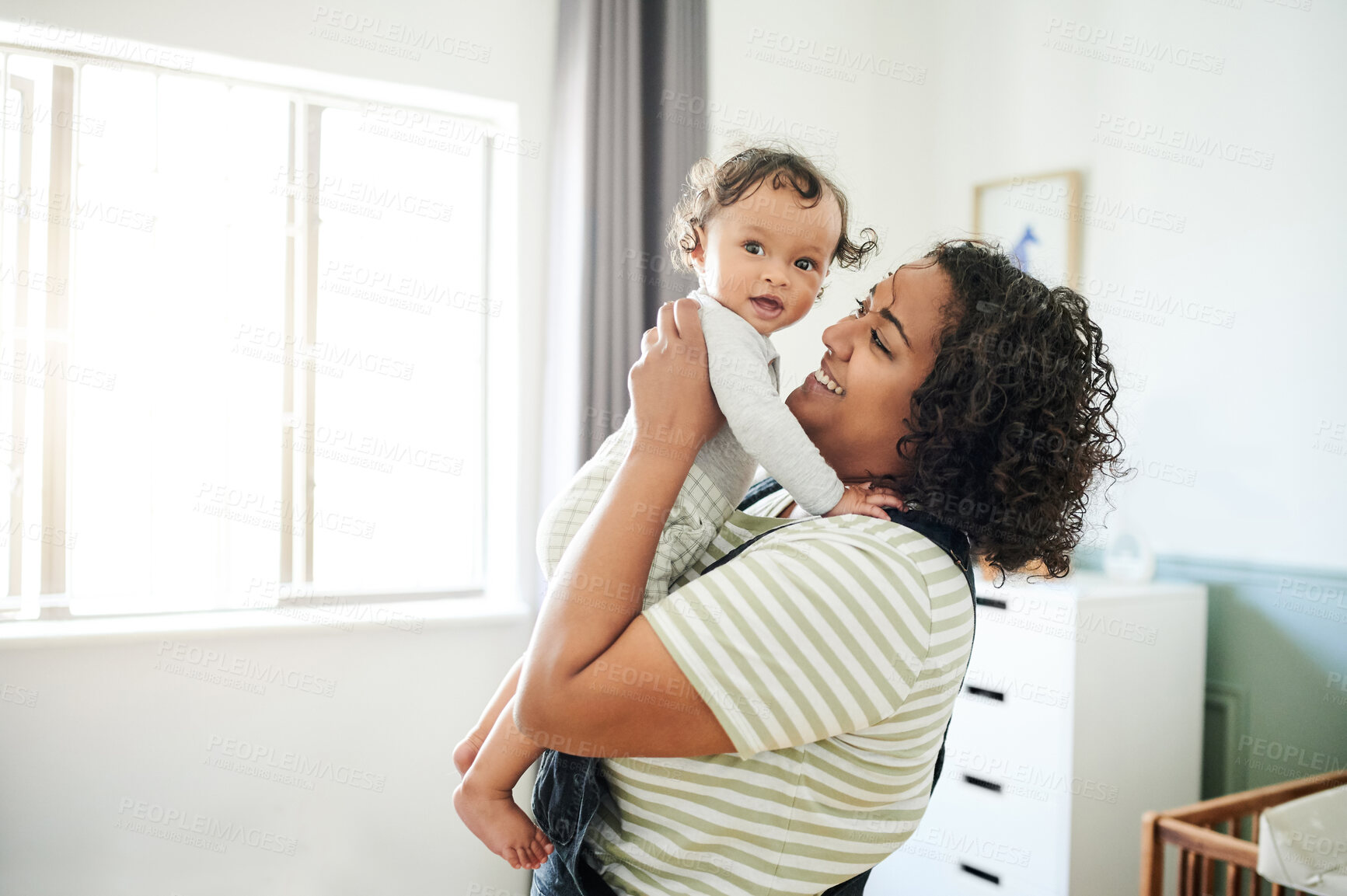 Buy stock photo Love, happy and mother with her baby in his nursery bonding, playing and connecting at their home. Happiness, smile and young woman holding her infant newborn boy in the bedroom of their modern house