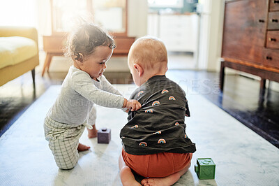 Buy stock photo Kids, home and baby toys for mobility development and learning together in a bedroom. Nursery, toy brick and cute children curious about build play and game for youth activity in a house on the floor