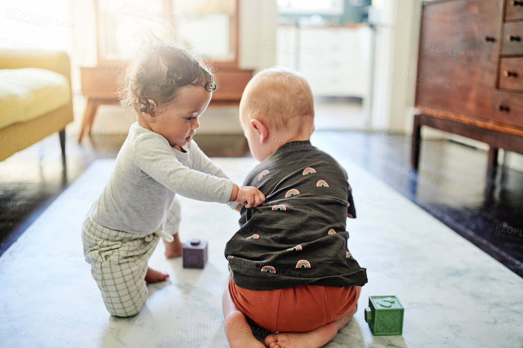 Buy stock photo Kids, home and baby toys for mobility development and learning together in a bedroom. Nursery, toy brick and cute children curious about build play and game for youth activity in a house on the floor