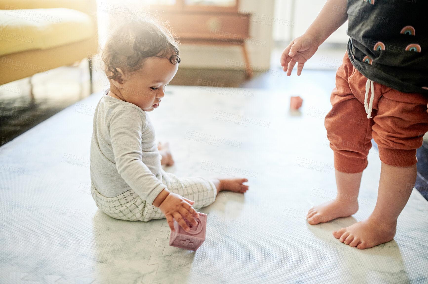 Buy stock photo Baby, living room and kids play with toys for bonding, quality time and child development at home. Family, siblings and children playing with shape, building blocks and relax together on house floor