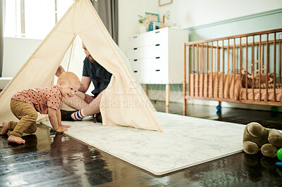 Buy stock photo Dad, baby and play in tent in home, having fun and bonding together. Child, care and happiness of father playing with infant, toddler or kid, relax and enjoying quality time in house with parent.