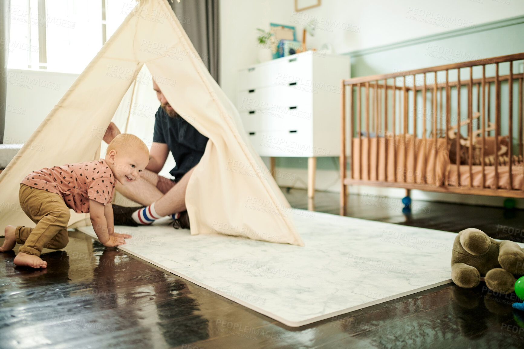 Buy stock photo Dad, baby and play in tent in home, having fun and bonding together. Child, care and happiness of father playing with infant, toddler or kid, relax and enjoying quality time in house with parent.