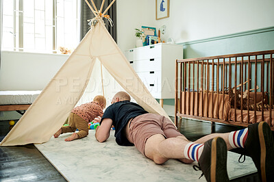 Buy stock photo Baby, father and playing with balls in tent at home, having fun and bonding together. Child, care and dad play with toys lying down with infant, toddler or kid enjoying quality family time in house.